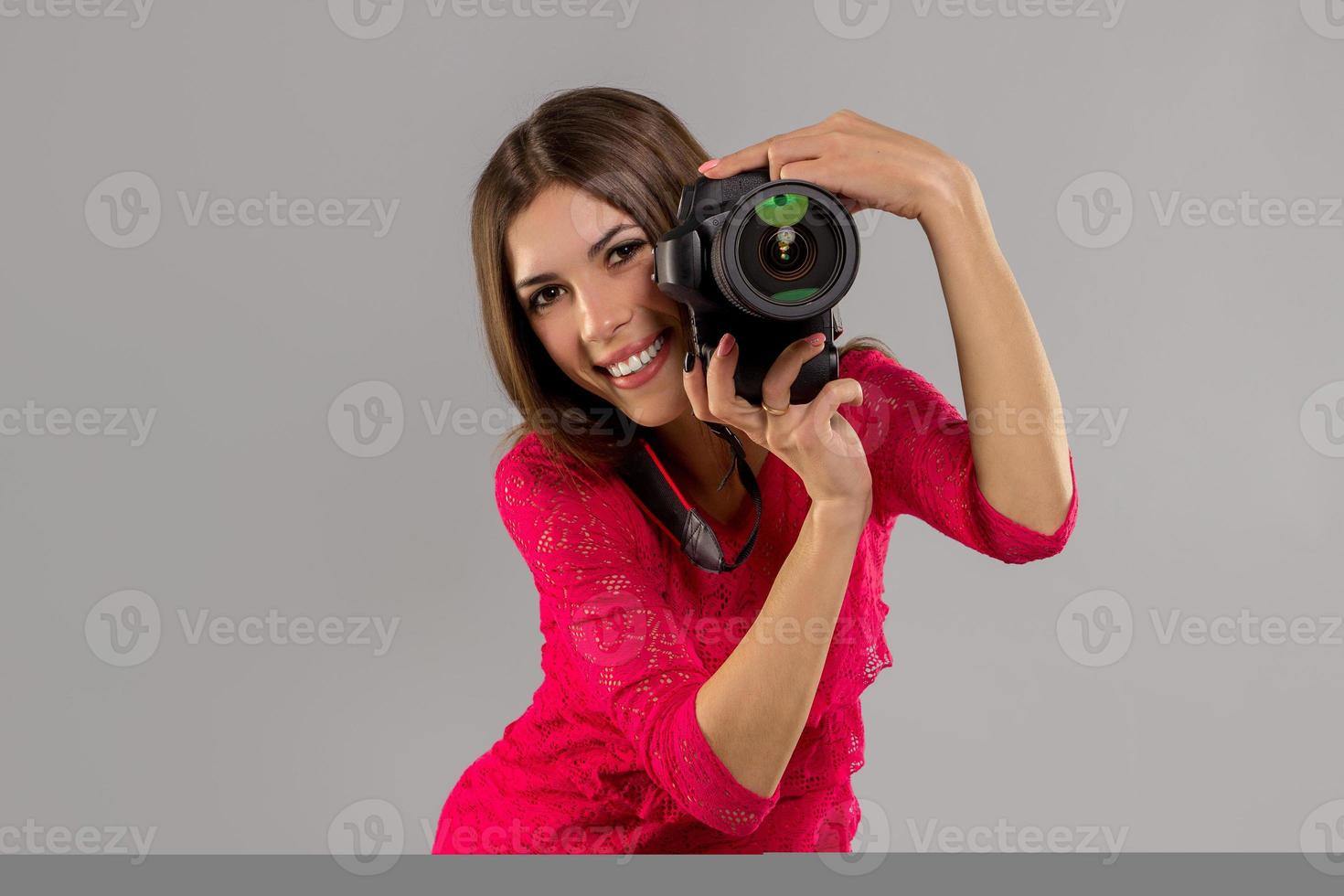 menina com câmera fotográfica foto