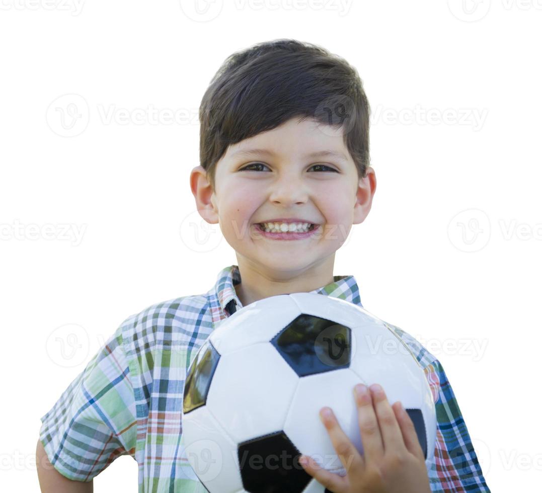 menino bonito segurando uma bola de futebol isolada no branco foto