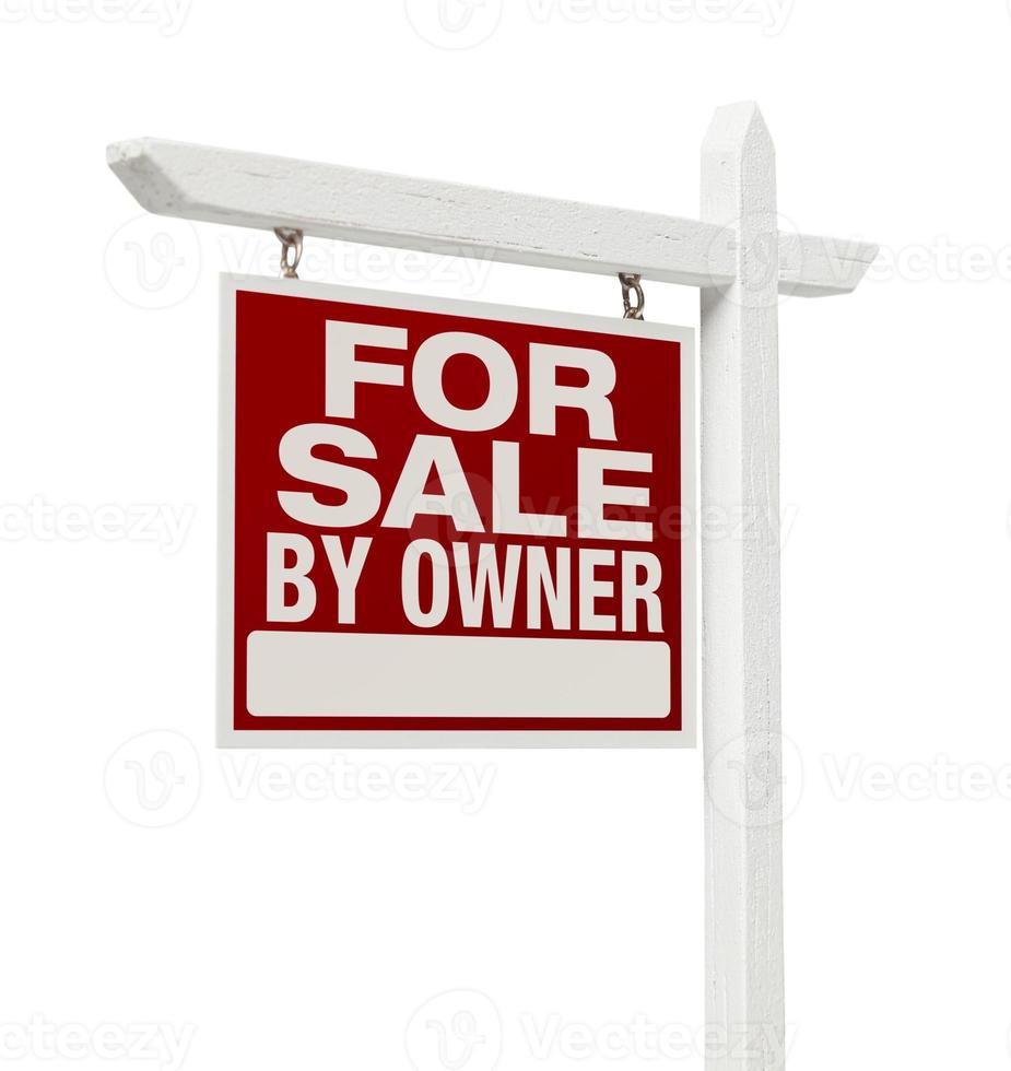 à venda pelo sinal imobiliário do proprietário isolado no branco foto