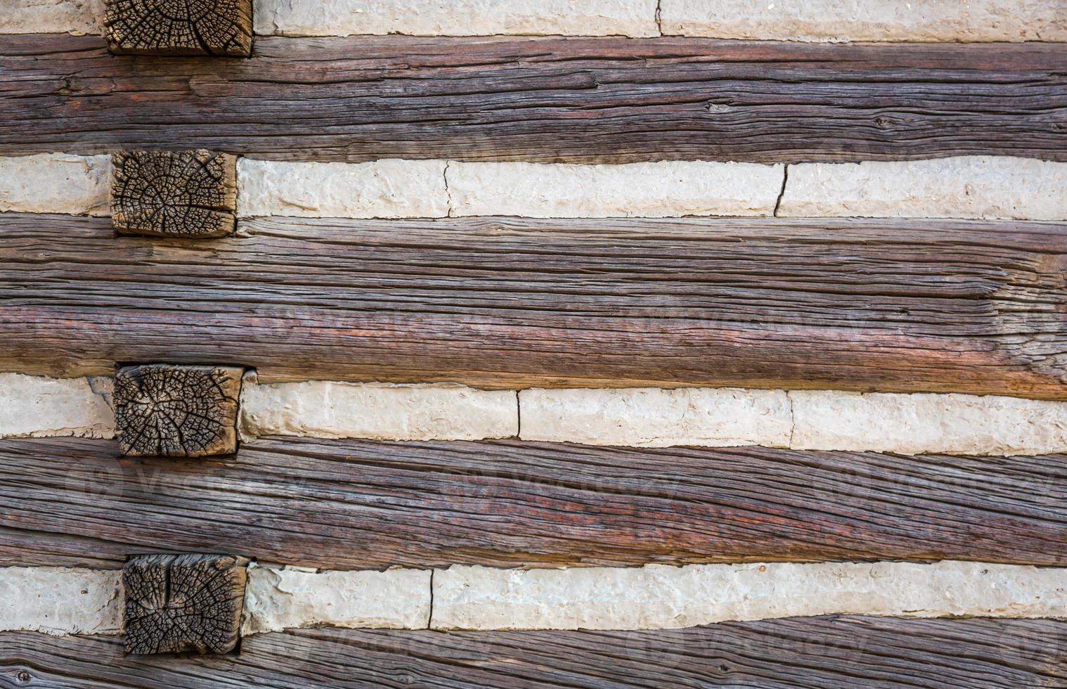 resumo da parede da cabana de madeira antiga vintage. foto