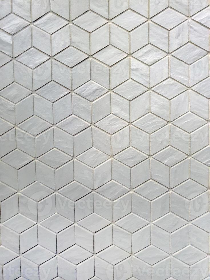 azulejos de mosaico de cerâmica de cor prata brilhante em hexágono 3d de design especial, forma retangular, geométrico, textura, pano de fundo, fundo abstrato, arte de design foto