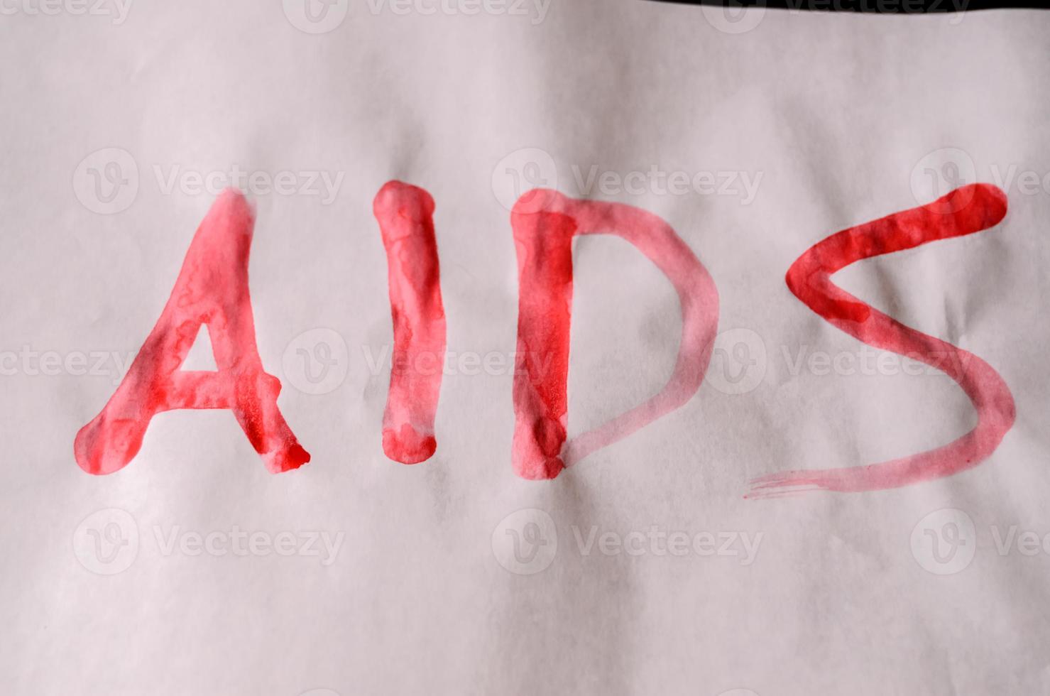 vírus da aids escrito em papel foto