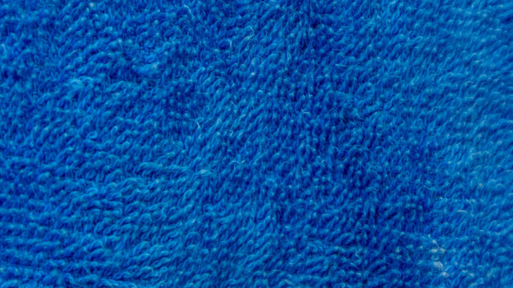 textura de toalha azul como pano de fundo foto