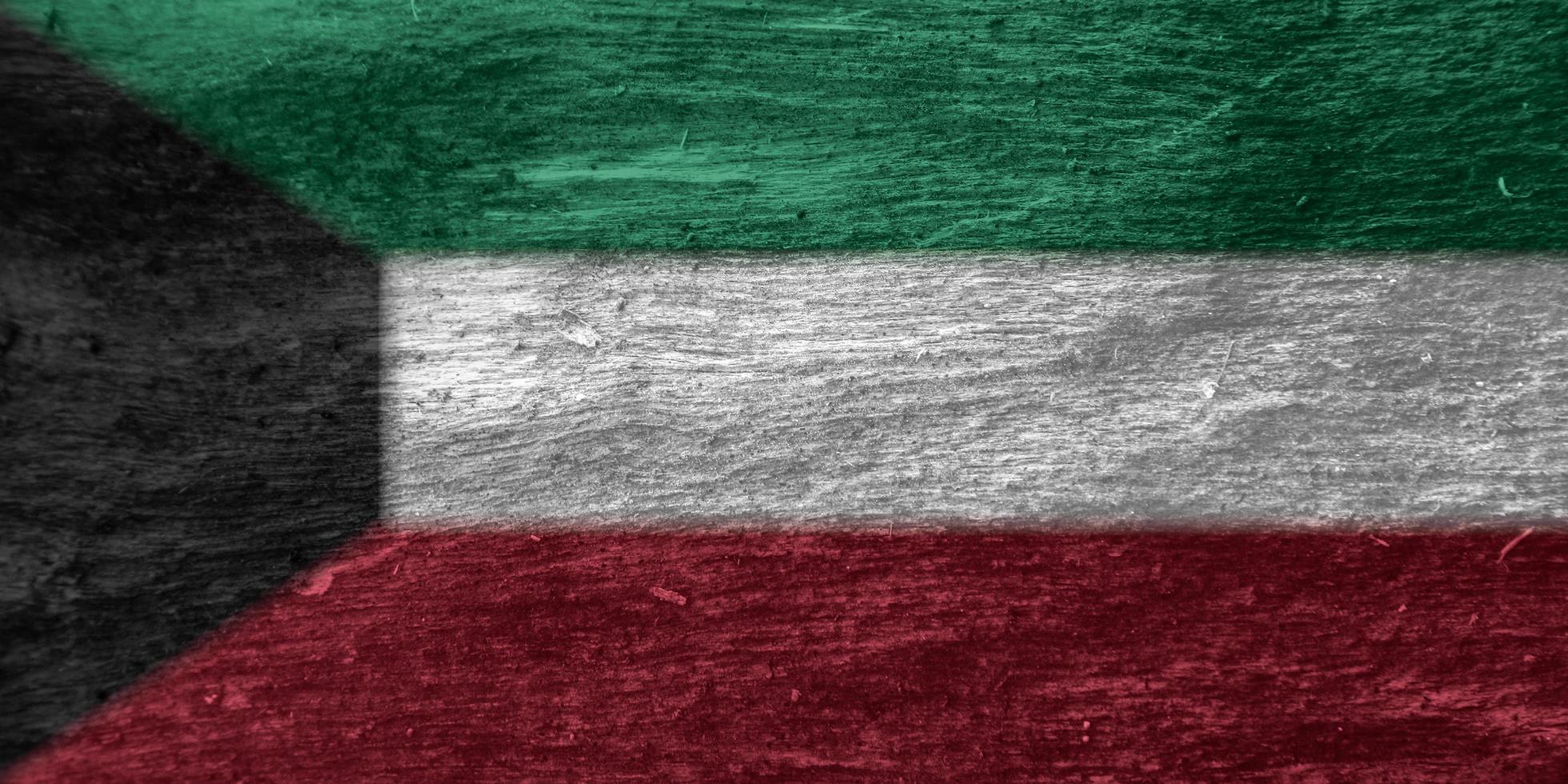 textura da bandeira do Kuwait como plano de fundo foto