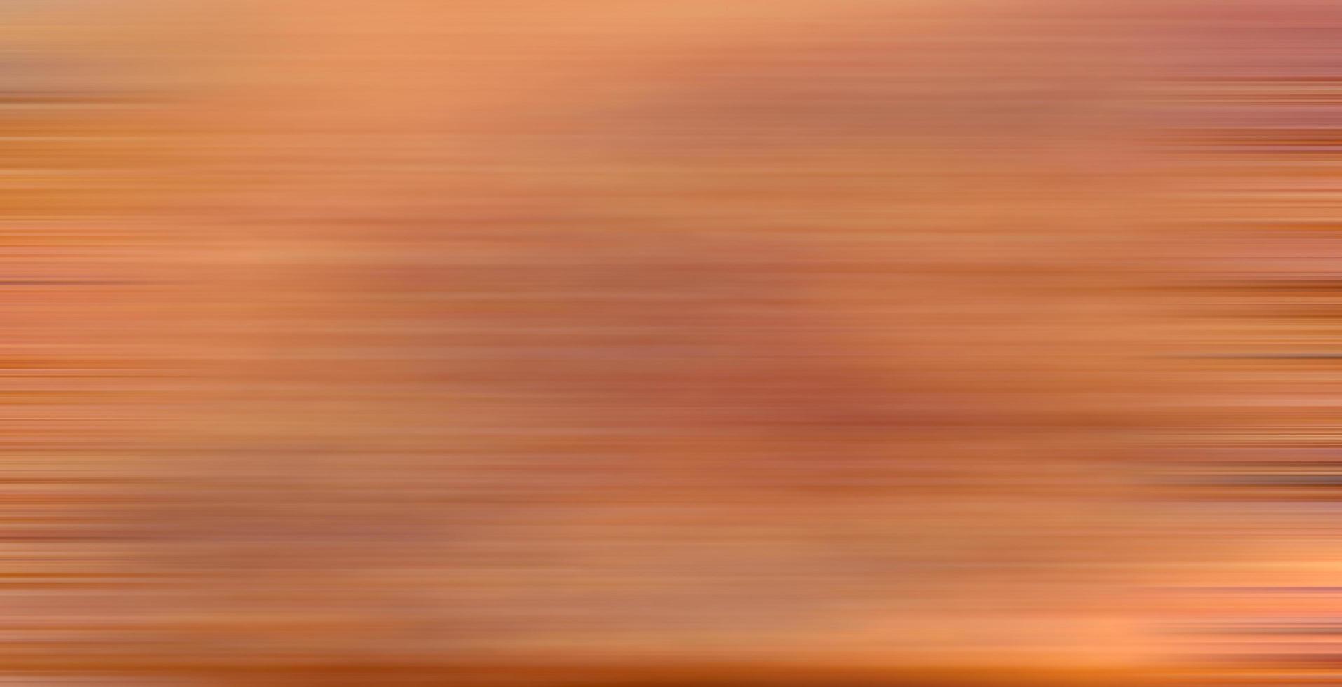 fundo de desfoque de movimento laranja abstrato foto