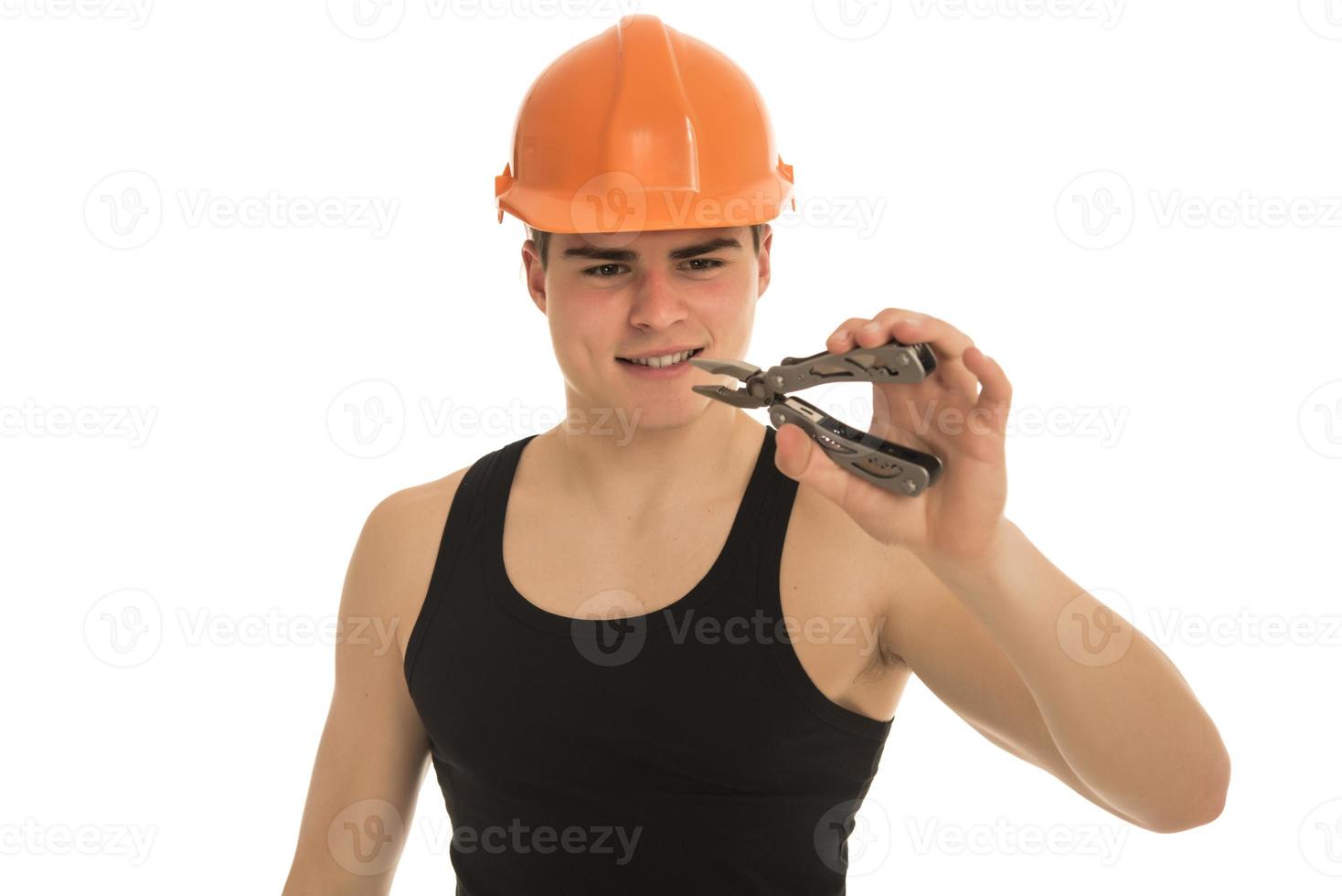 retrato de capataz jovem feliz com capacete foto