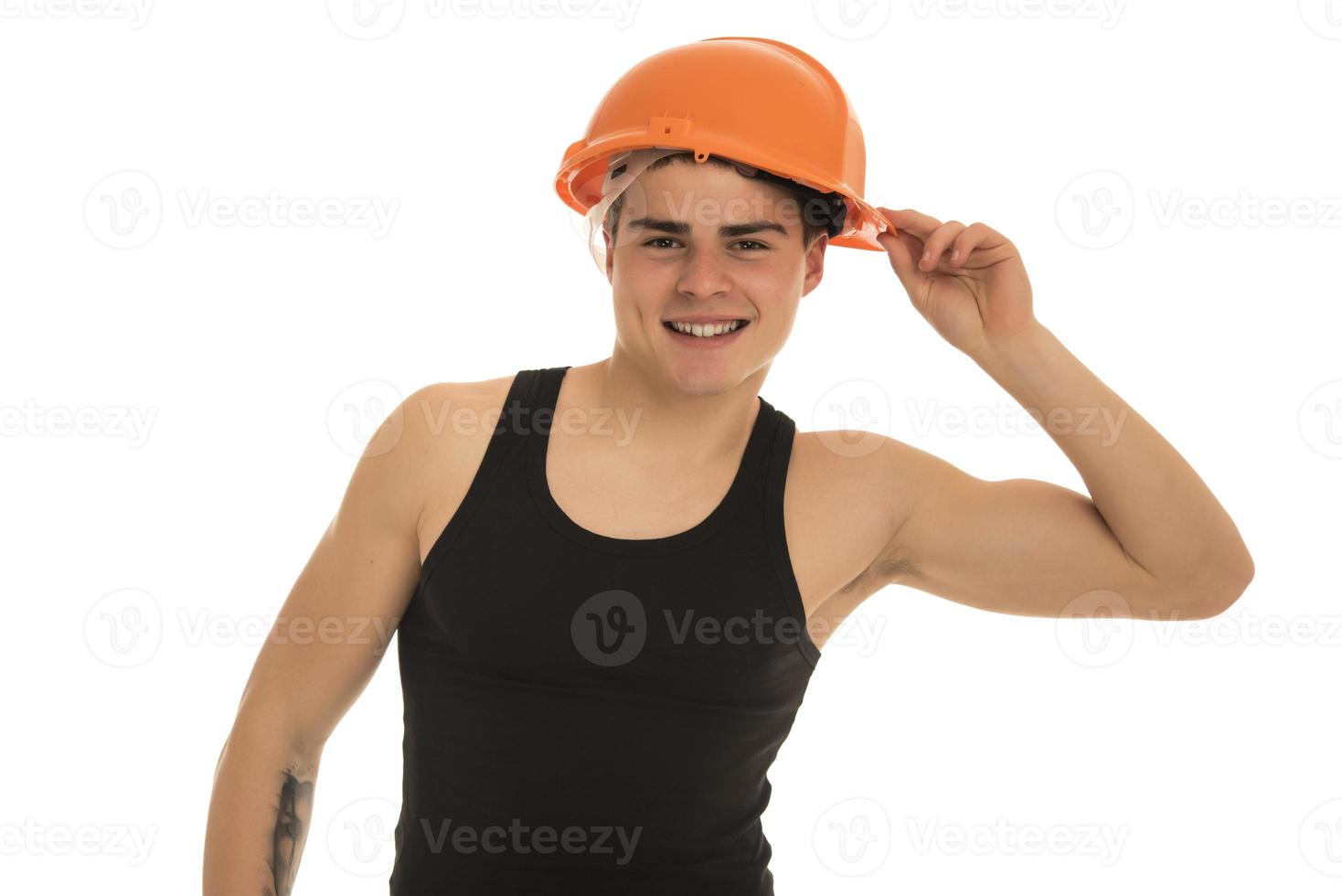 retrato de capataz jovem feliz com capacete foto