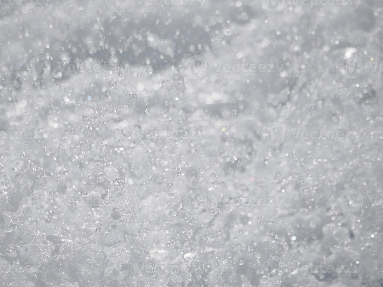 salpicos de água e detalhes de pequenas gotas foto