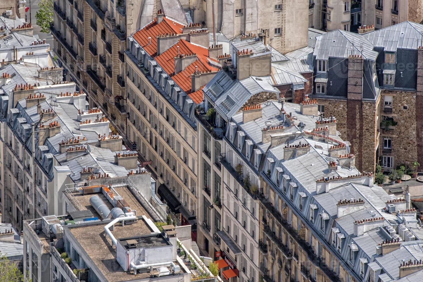 telhados de paris e construção de vista da cidade foto