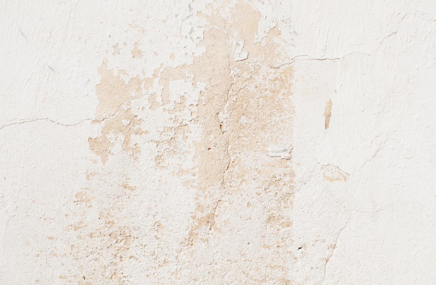textura de parede de concreto branco rachado foto