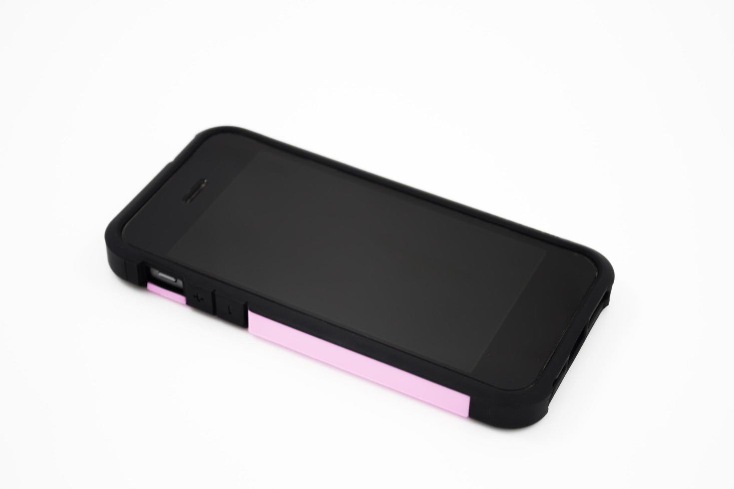 smartphone preto com capa rosa foto