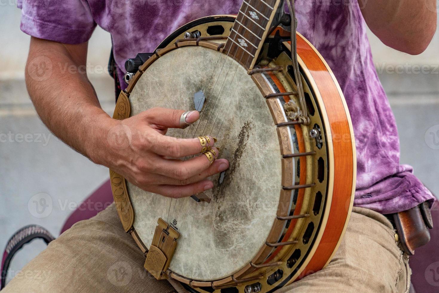 tocador de banjo artista de rua em nyc foto