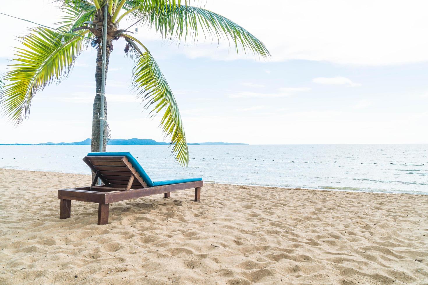 ilha paradisíaca cadeira de praia fundo foto