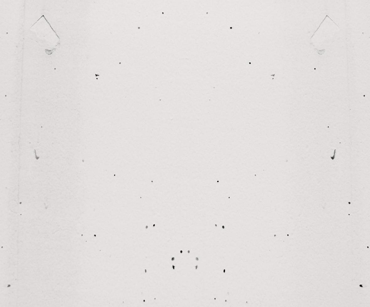 pontos na textura da parede de concreto foto