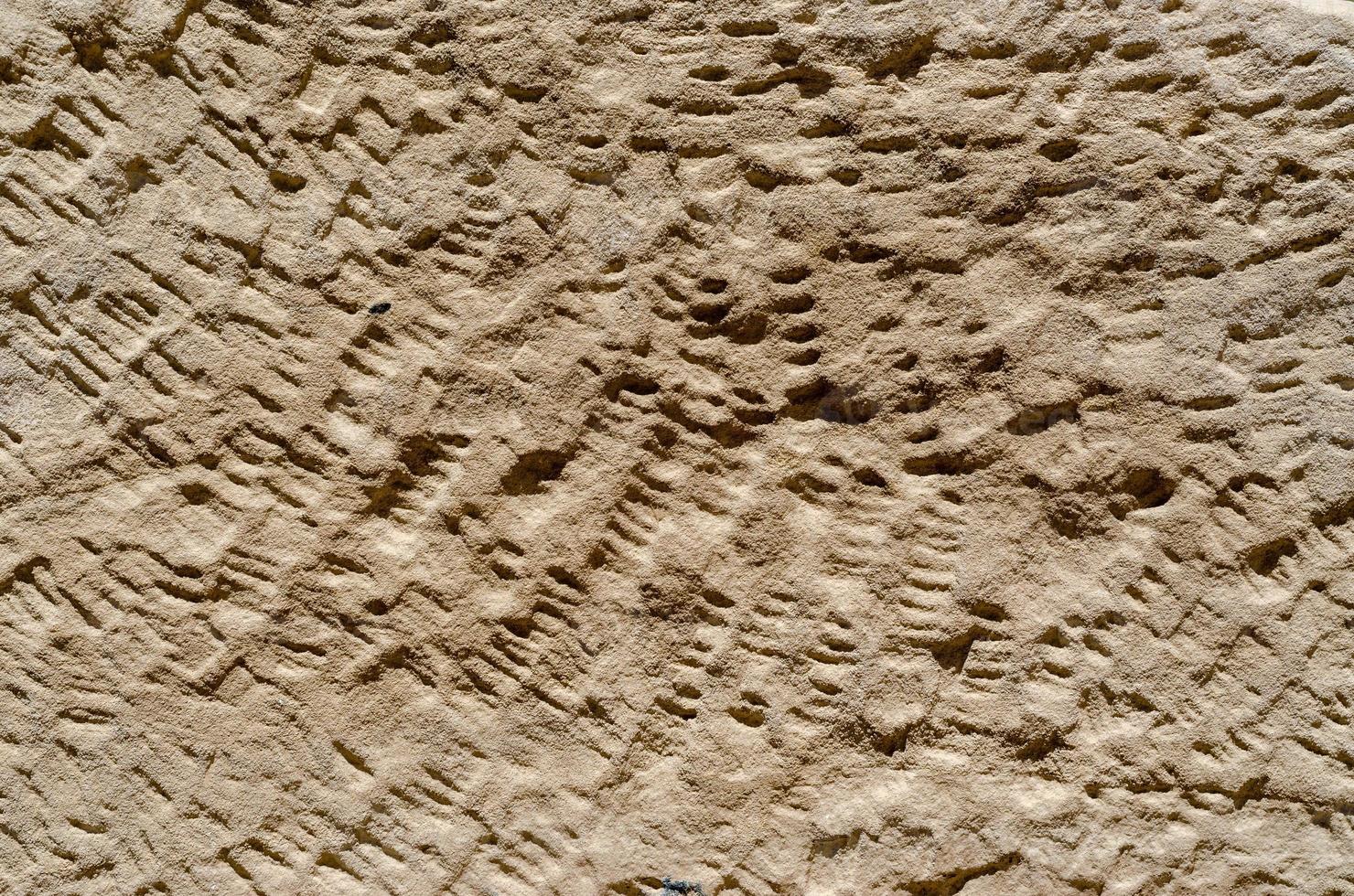 textura padrão da velha parede de pedra antiga em luxor Egito foto