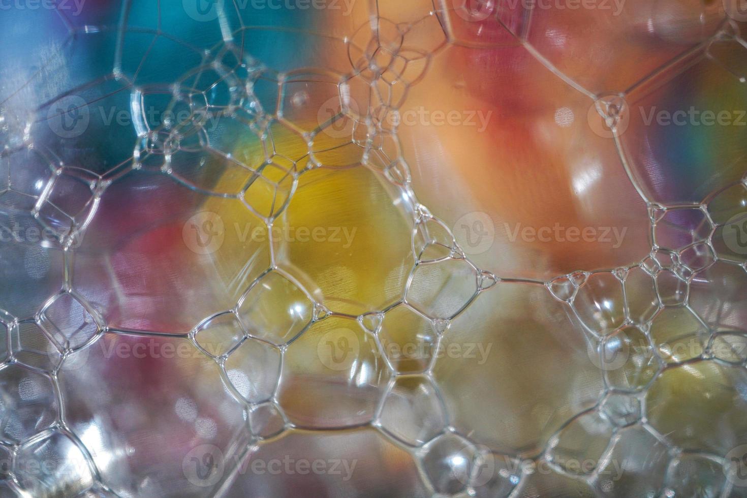 bolhas de sabão no fundo abstrato colorido foto