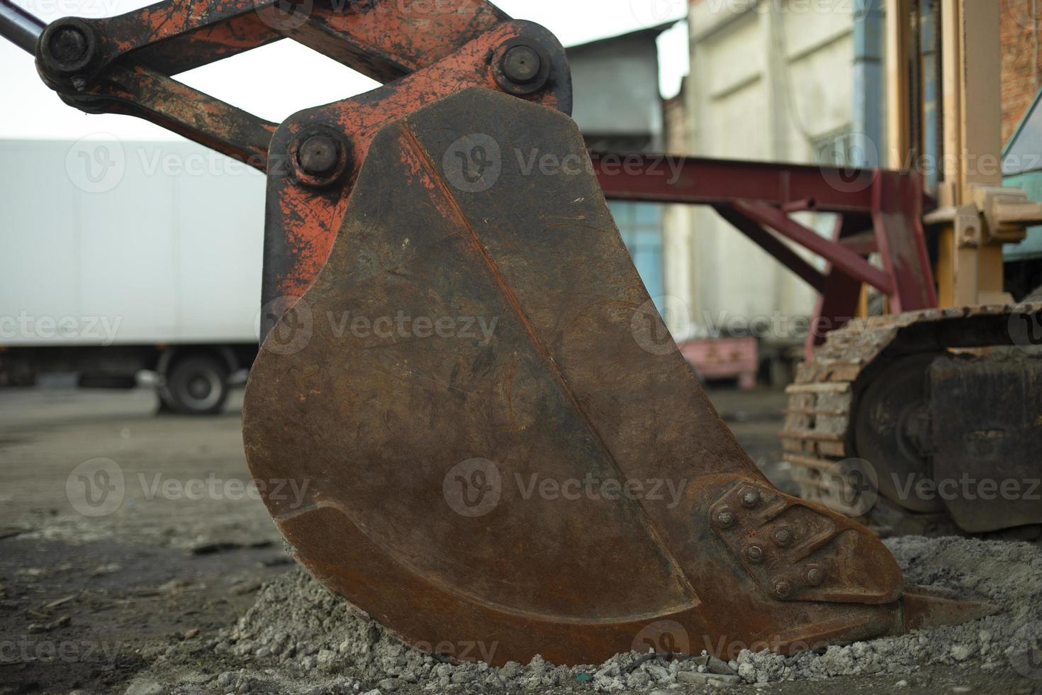 caçamba de escavadeira de aço. maquinaria. máquinas de construção em detalhe. foto