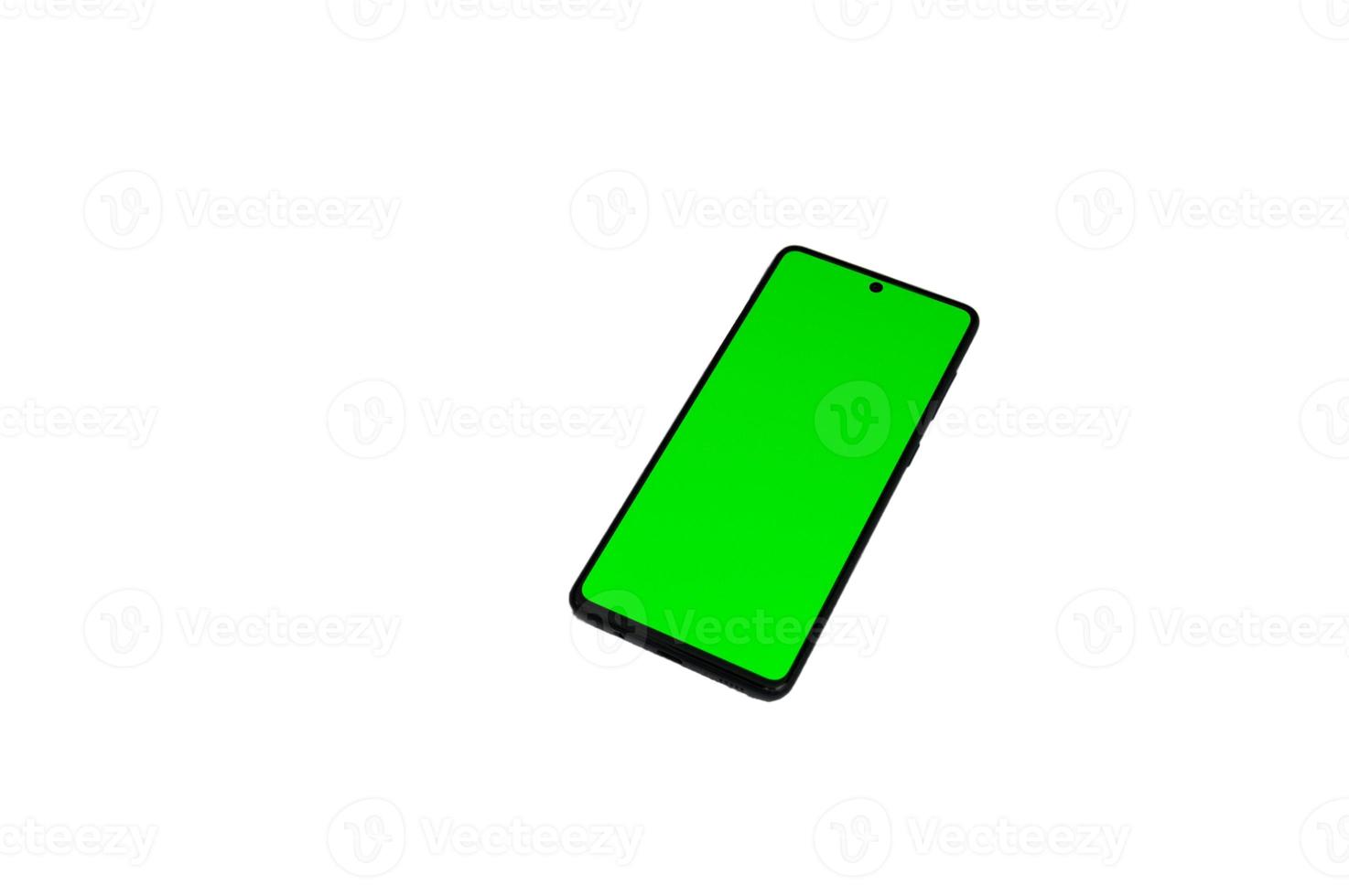 smartphone com tela verde, com traçado de recorte foto