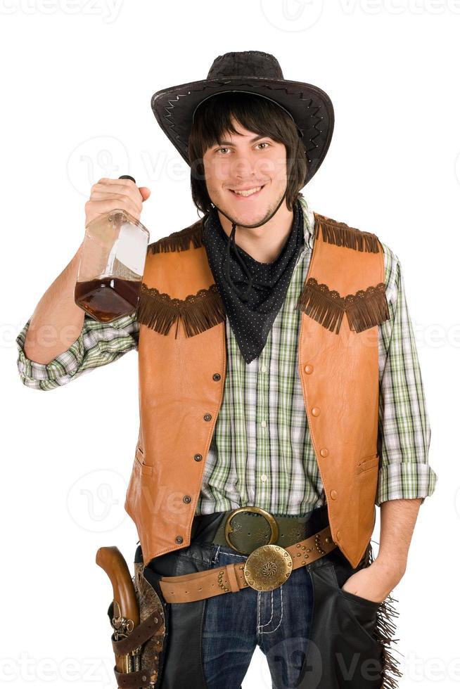 feliz jovem cowboy com uma garrafa foto