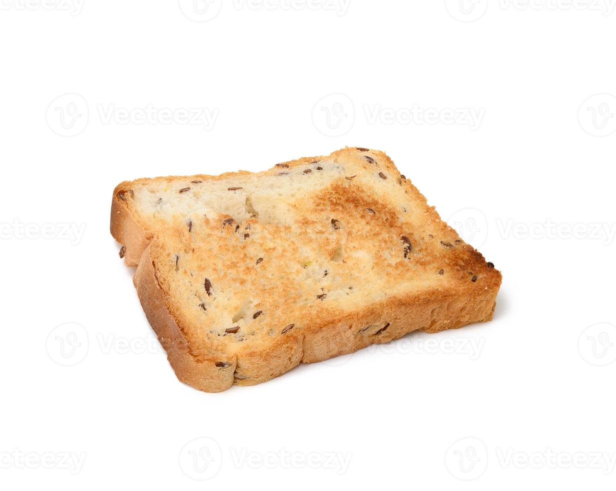 fatias quadradas de pão feitas de farinha de trigo branca torradas na torradeira, vista superior foto