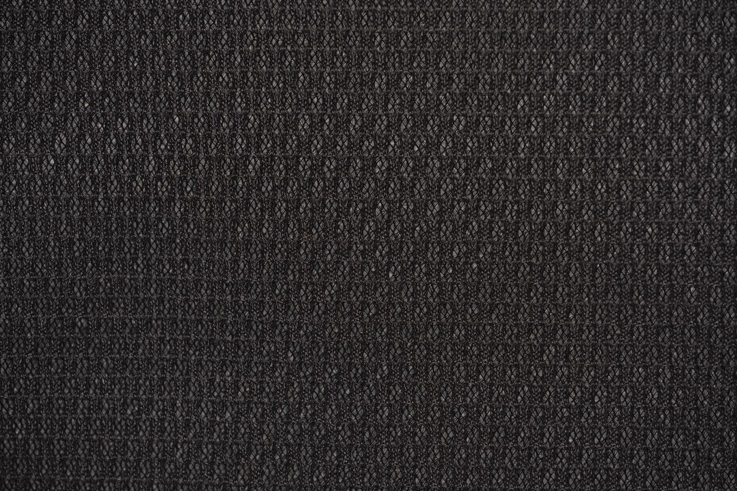 Fundo de tecido de nylon preto texturizado com forma hexagonal foto