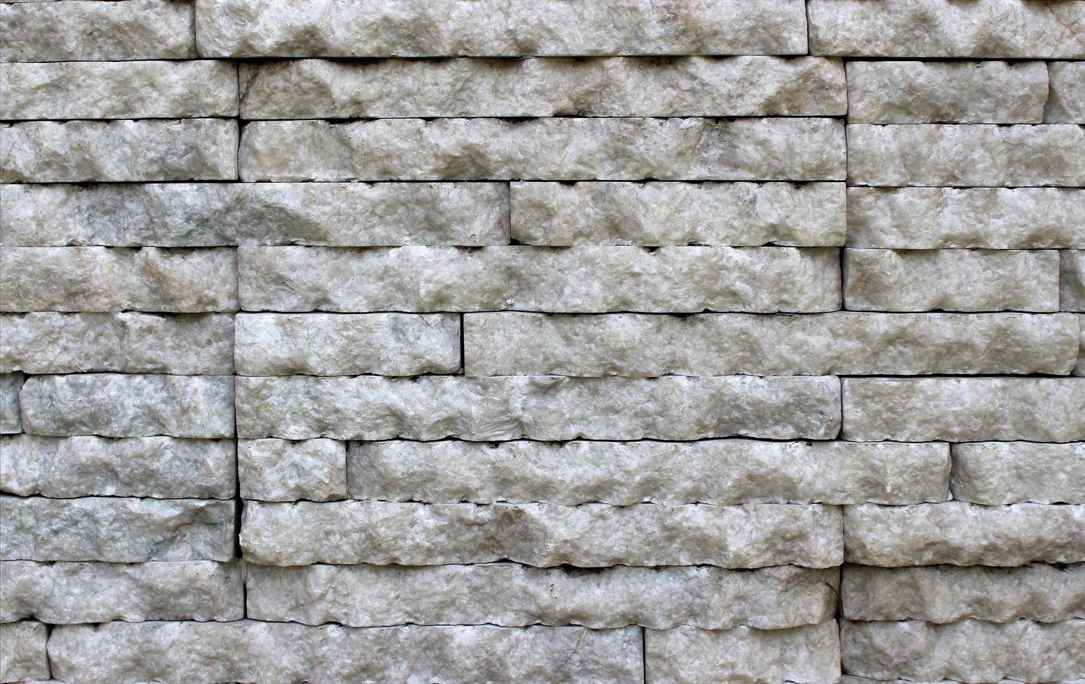 parede de tijolos de pedra foto
