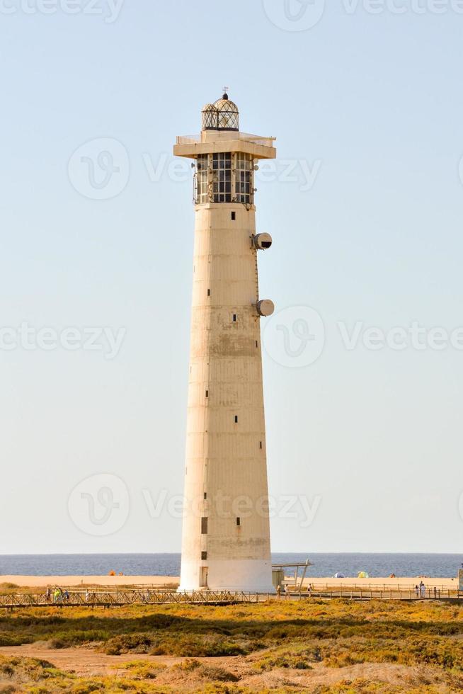 farol à beira-mar foto