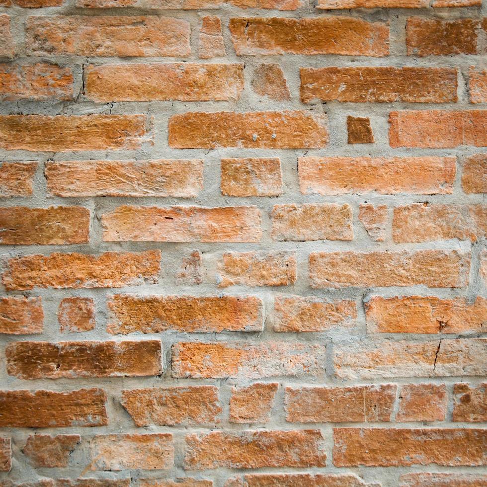 close-up de parede de tijolos antigos foto