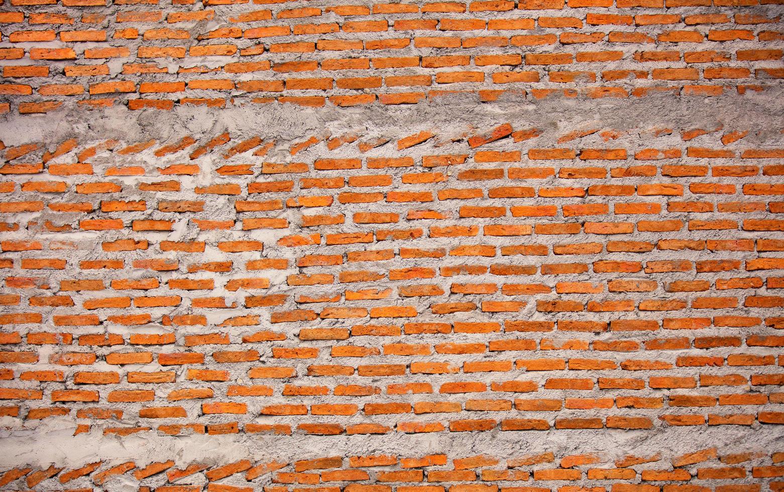 fundo de parede de tijolo vermelho foto