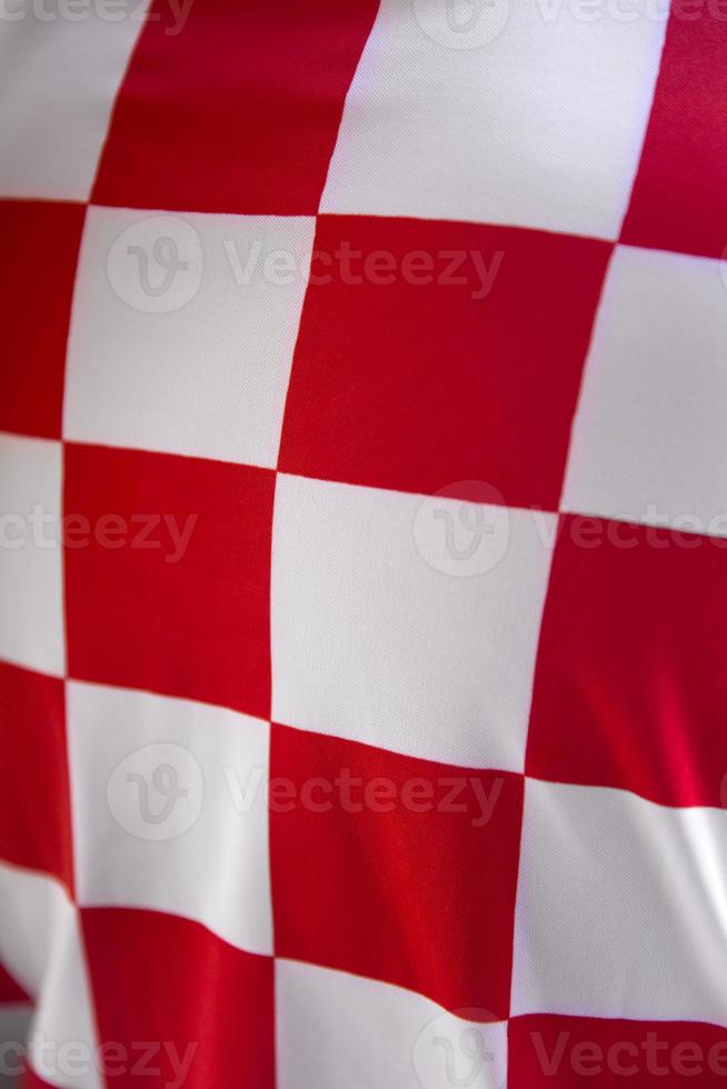 textura de bandeira quadriculada vermelha para pano de fundo foto