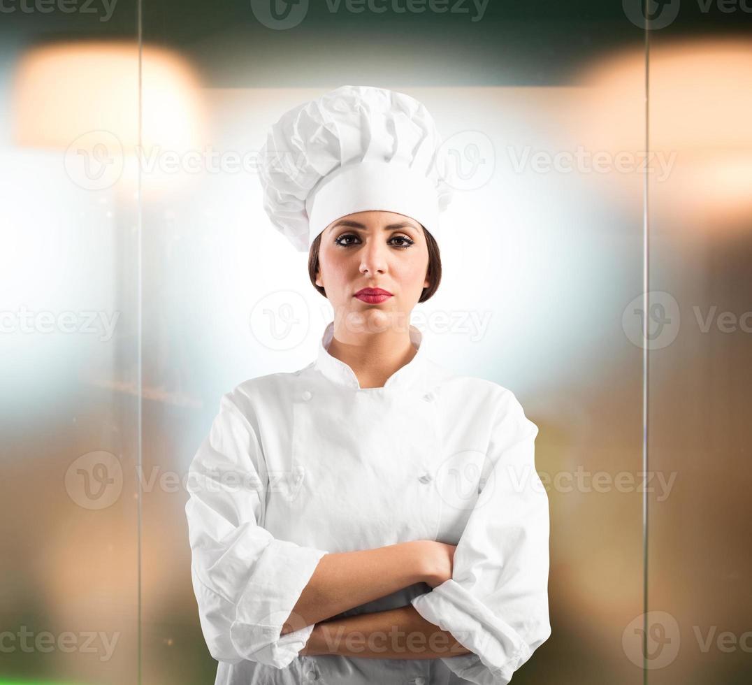 confiante mulher chefe de cozinha foto