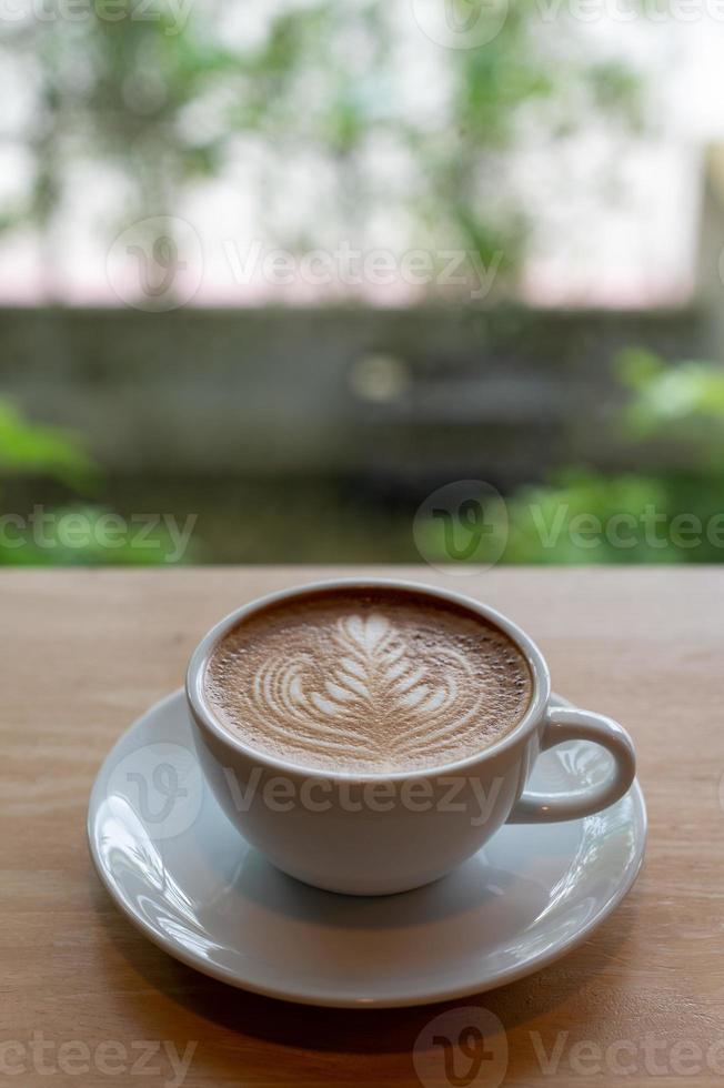 latte art em uma xícara de café foto