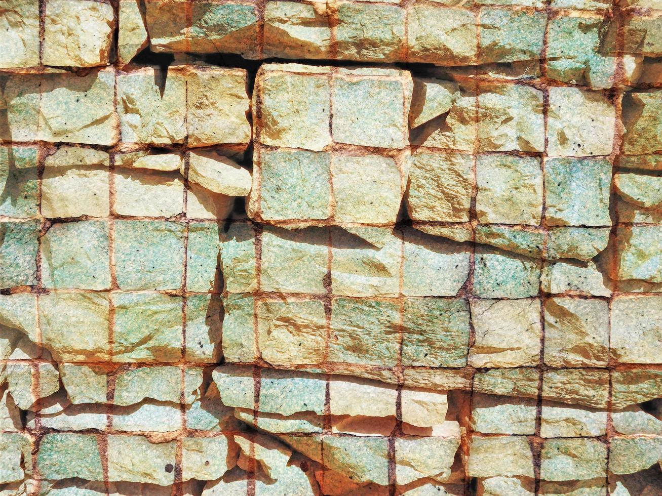 detalhe da parede de pedra ao ar livre para plano de fundo ou textura foto