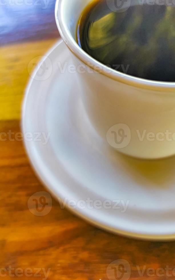 xícara de café preto americano no restaurante méxico. foto