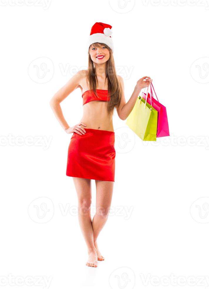 lindo santa Natal menina com compras bolsas em branco foto