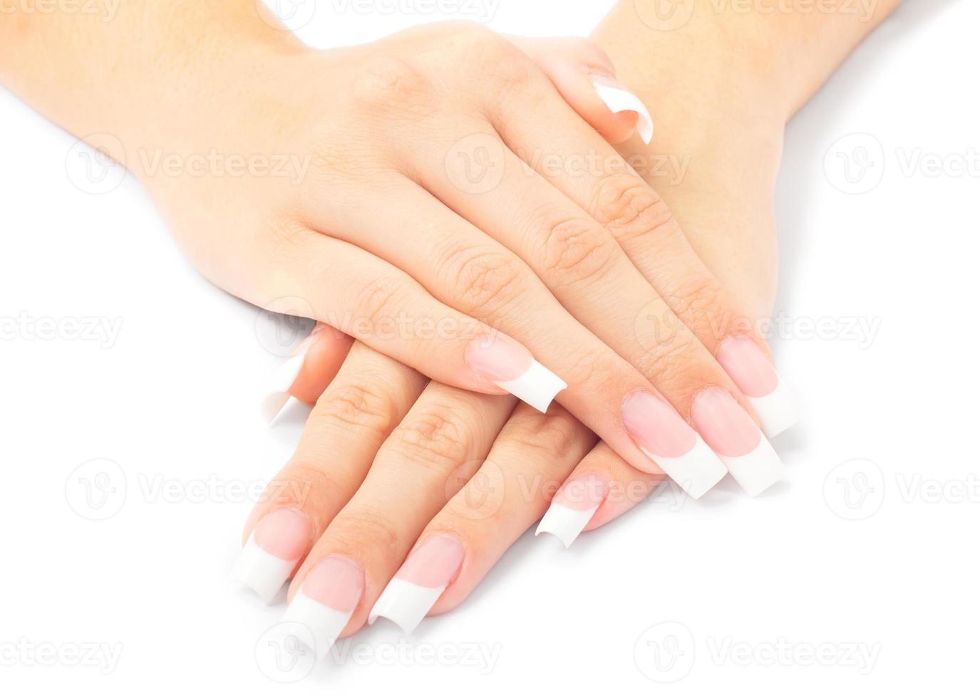 mulher mãos com francês manicure foto