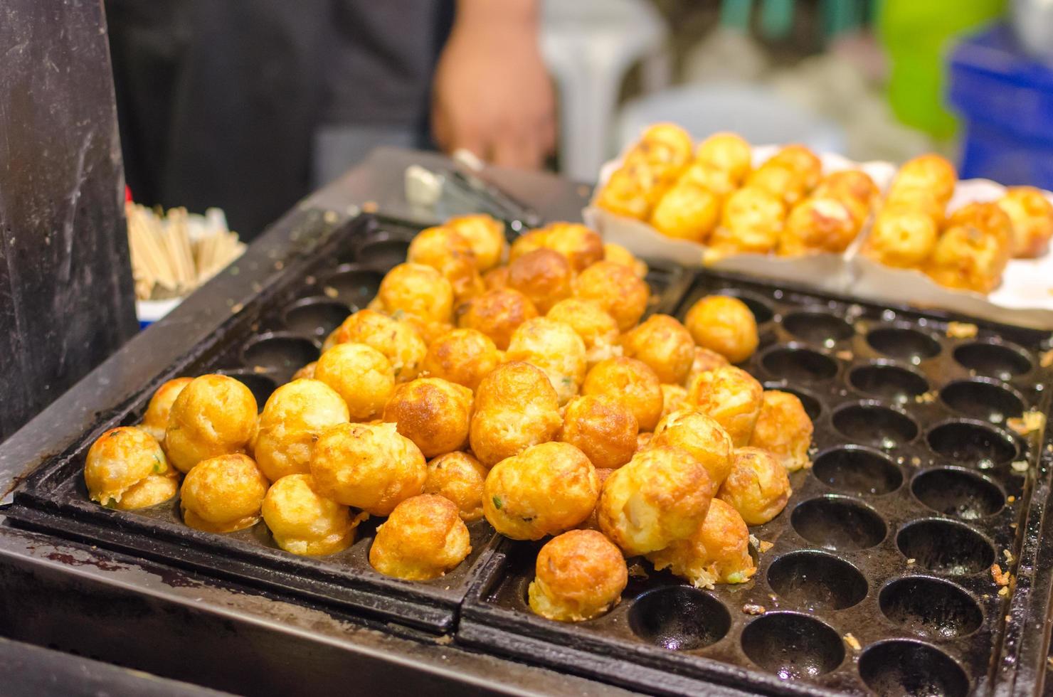 comida de rua takoyaki foto