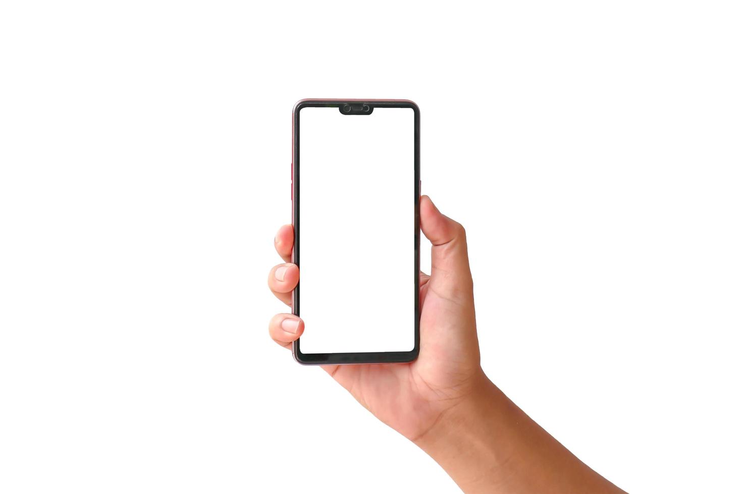 mão segurando um telefone celular isolado no fundo branco foto