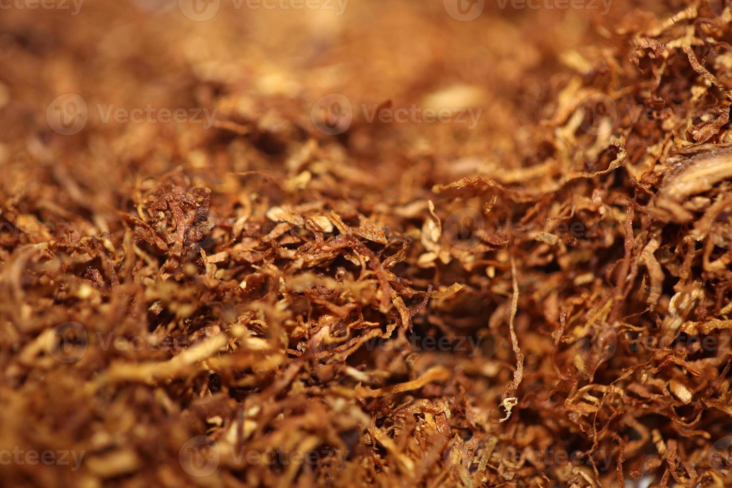 rolando tabaco fechar acima fundo grande Tamanho Alto qualidade estoque fotos fumar auto fez cigarros e articulação