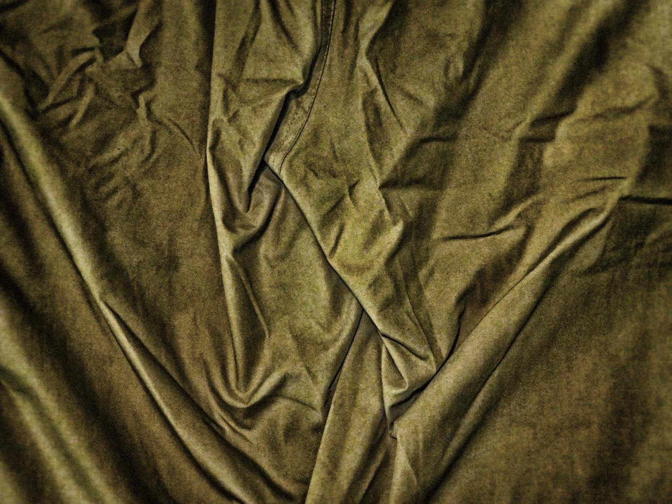 tecido verde amarrotado para fundo ou textura foto