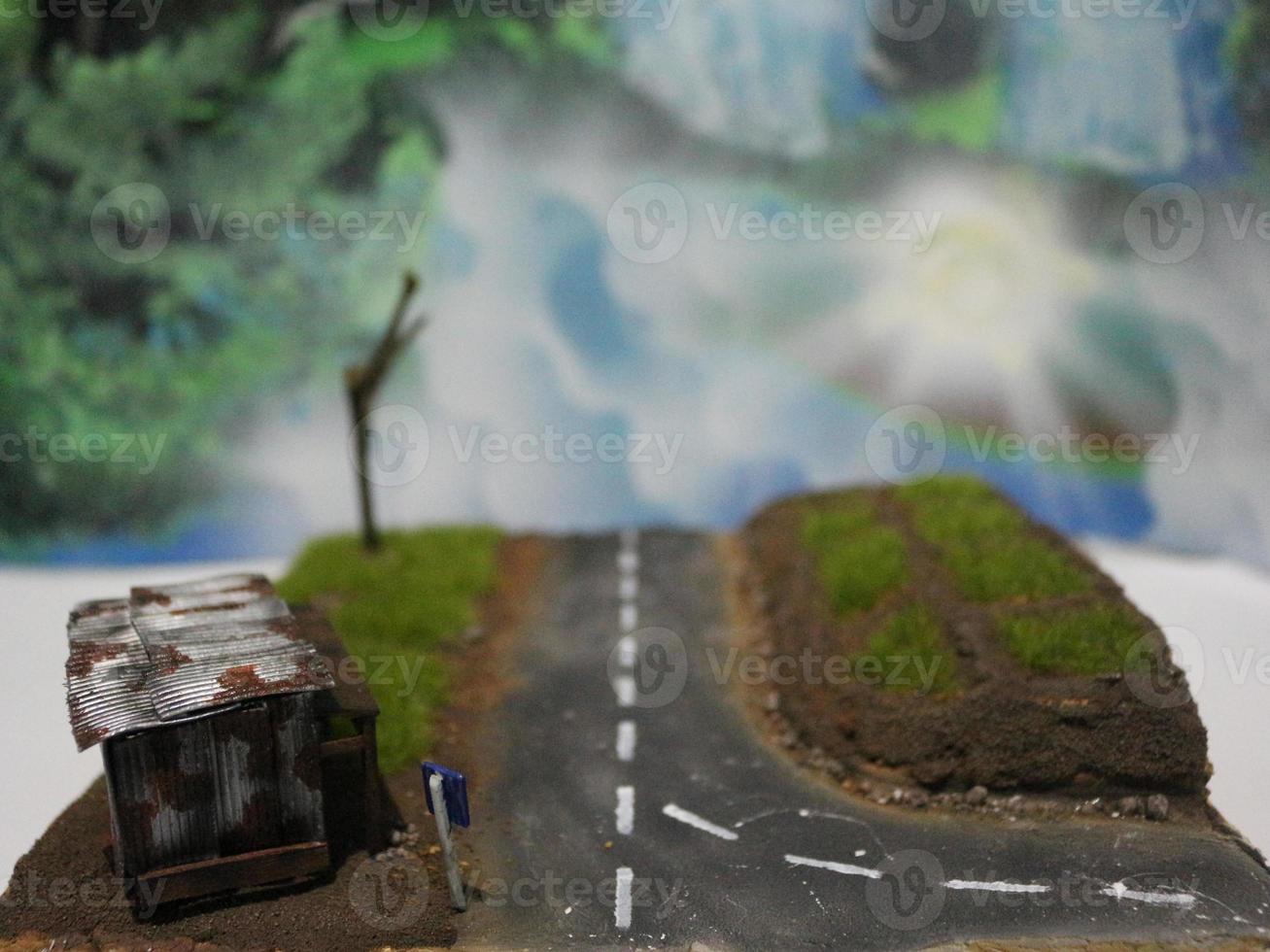 uma fechar acima do uma diorama do uma arroz campo cena e a velho beira da estrada casa. miniatura diorama foto conceito.