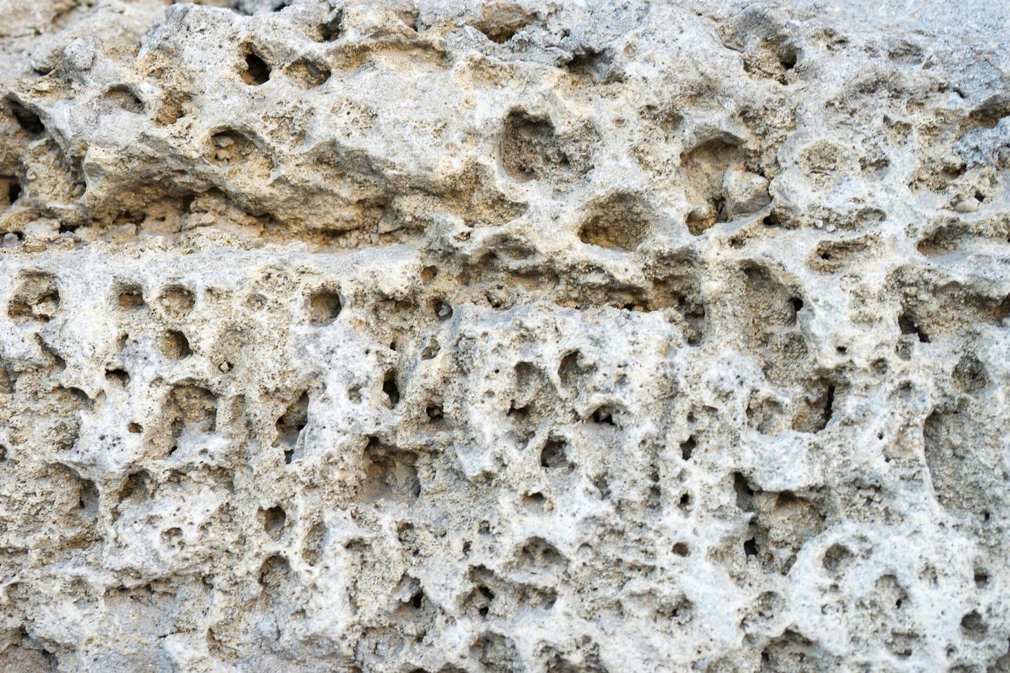 parede de rocha porosa para fundo ou textura foto