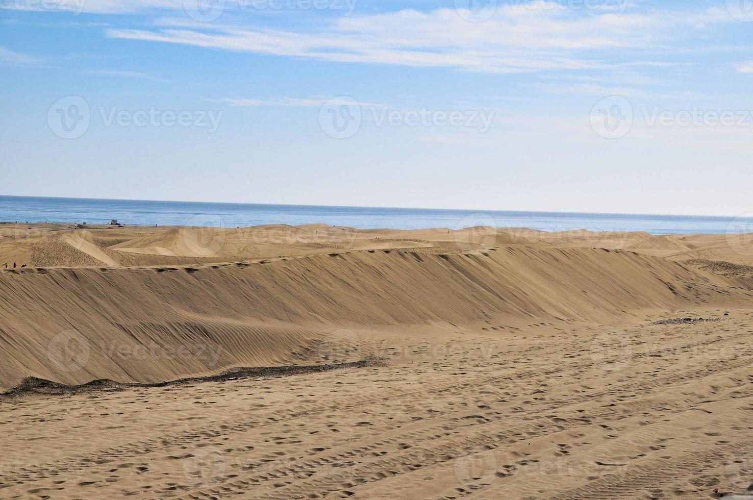 dunas de areia à beira-mar foto