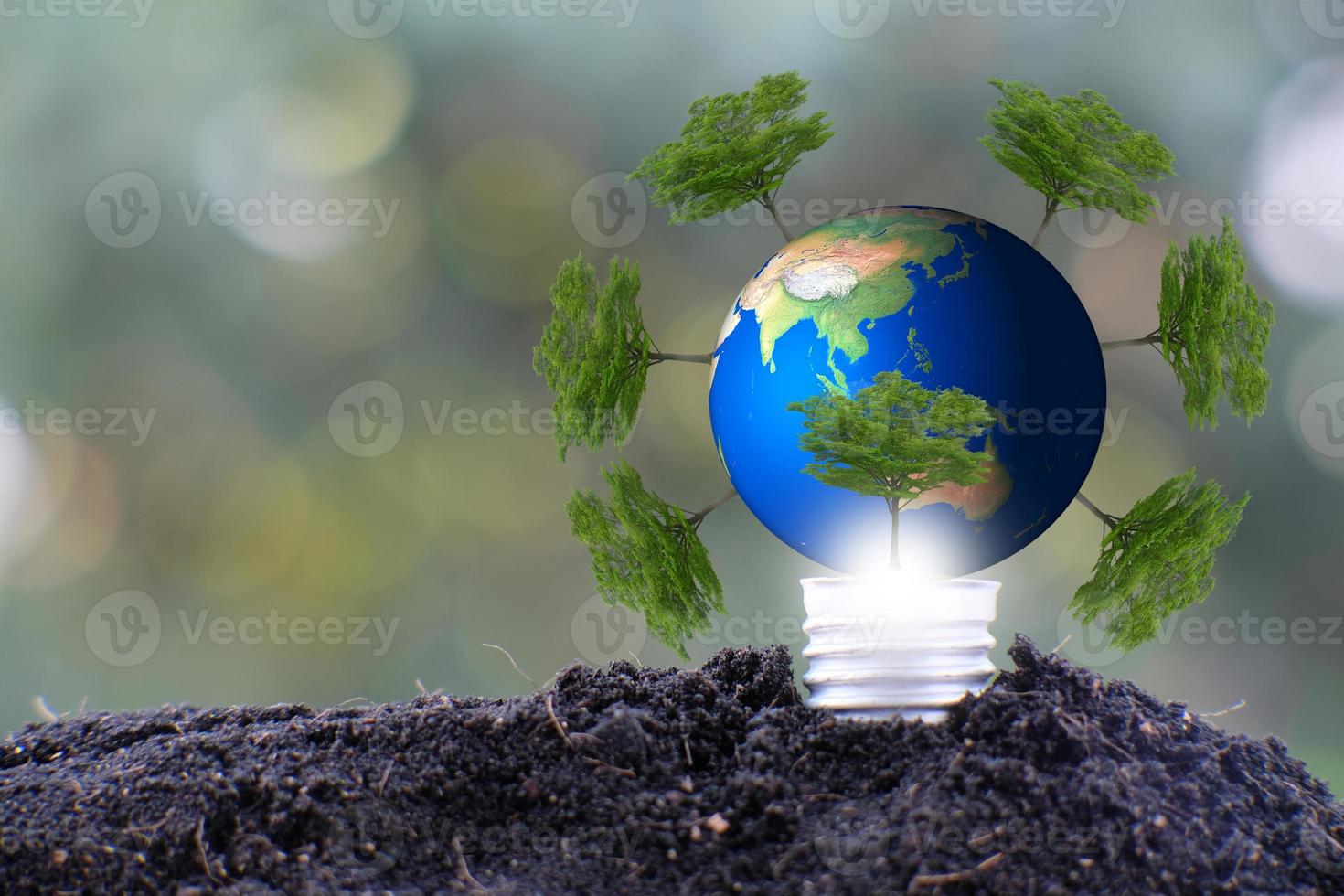 lâmpada, salvar mundo e conceito ecológico de negócios foto