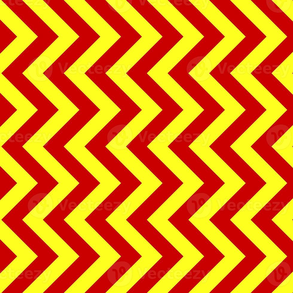 clássico vermelho e amarelo divisa desatado padronizar. desatado zig zag padronizar fundo. regular textura fundo. adequado para poster, folheto, folheto, pano de fundo, cartão, etc. foto