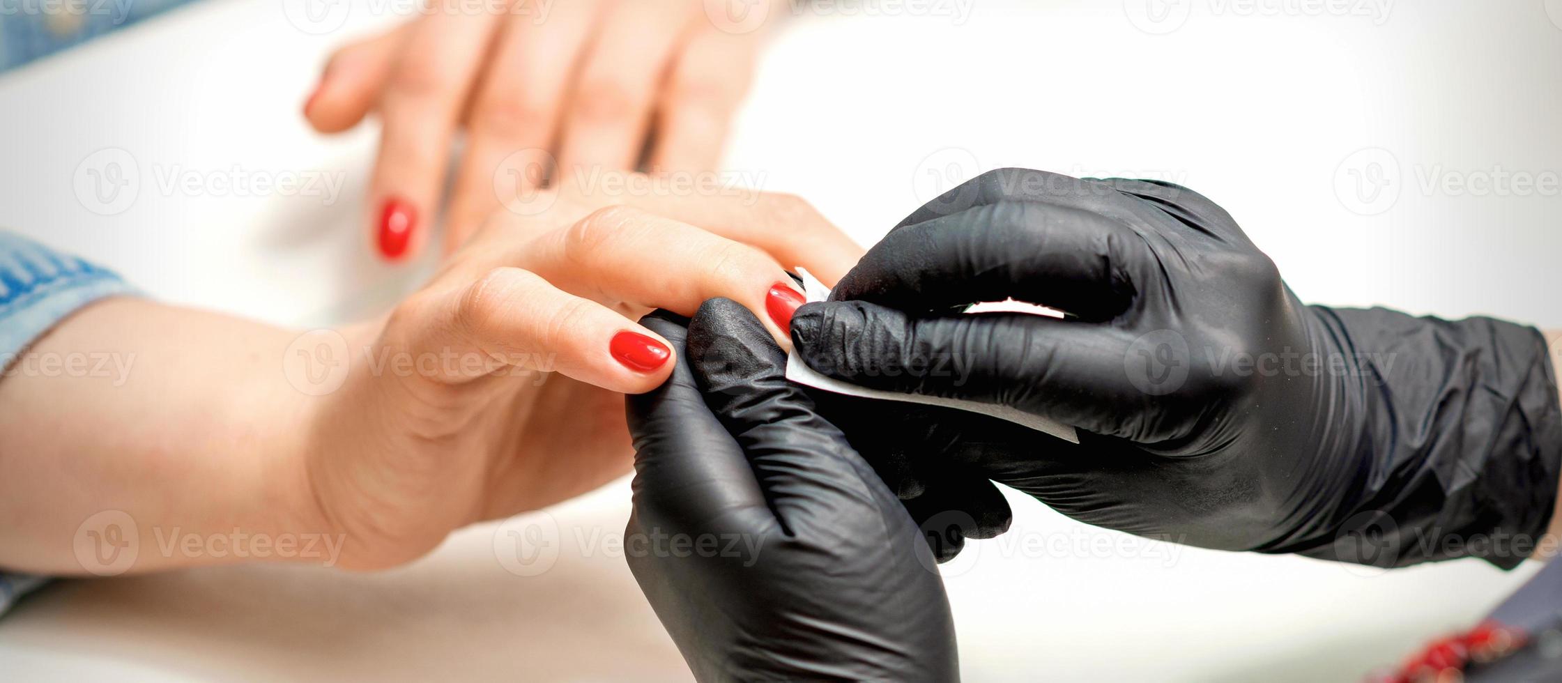 manicuro vazamentos fêmea vermelho unhas foto