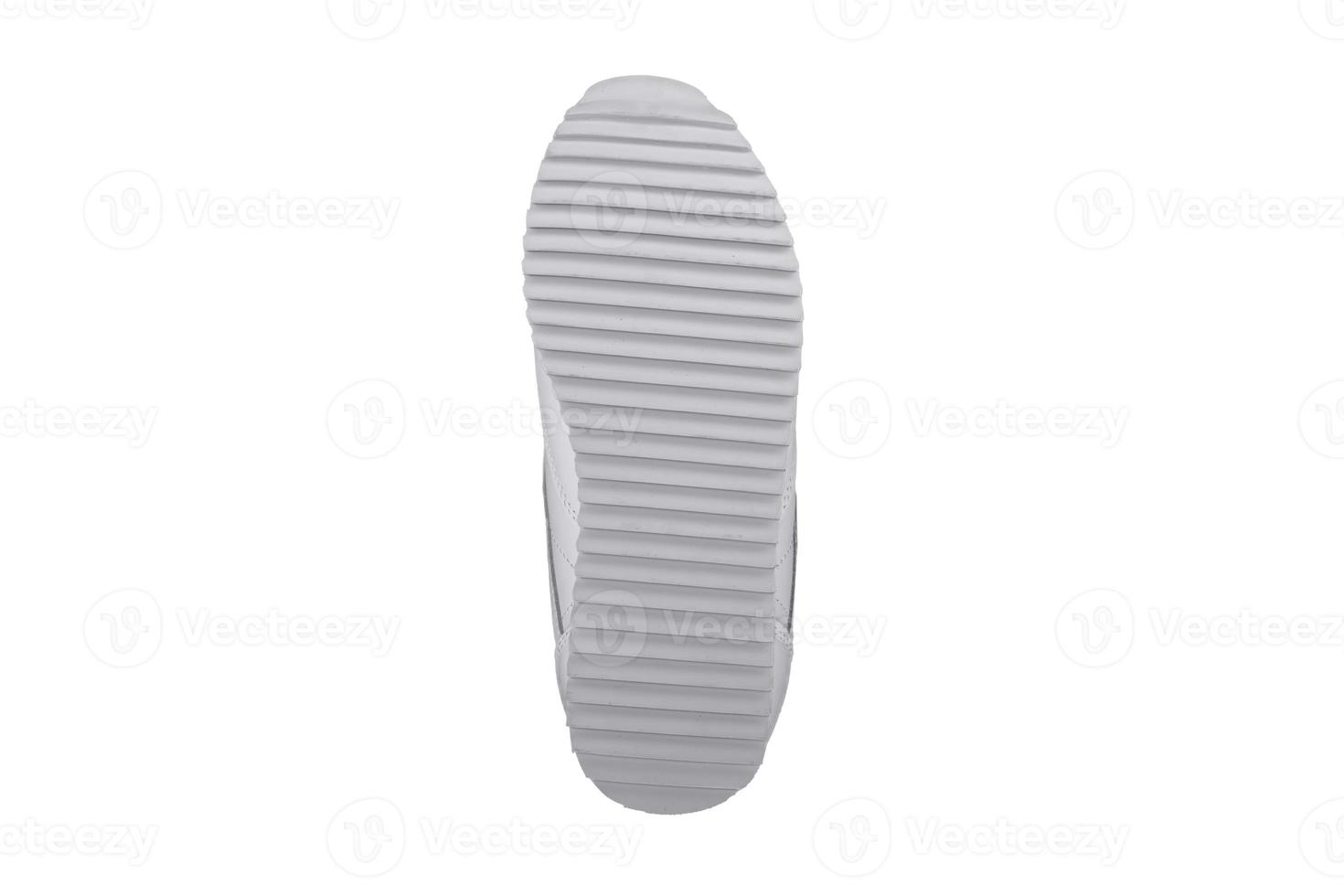 único branco poliuretano tênis em uma branco background.bottom Esportes sapatos poliéster foto