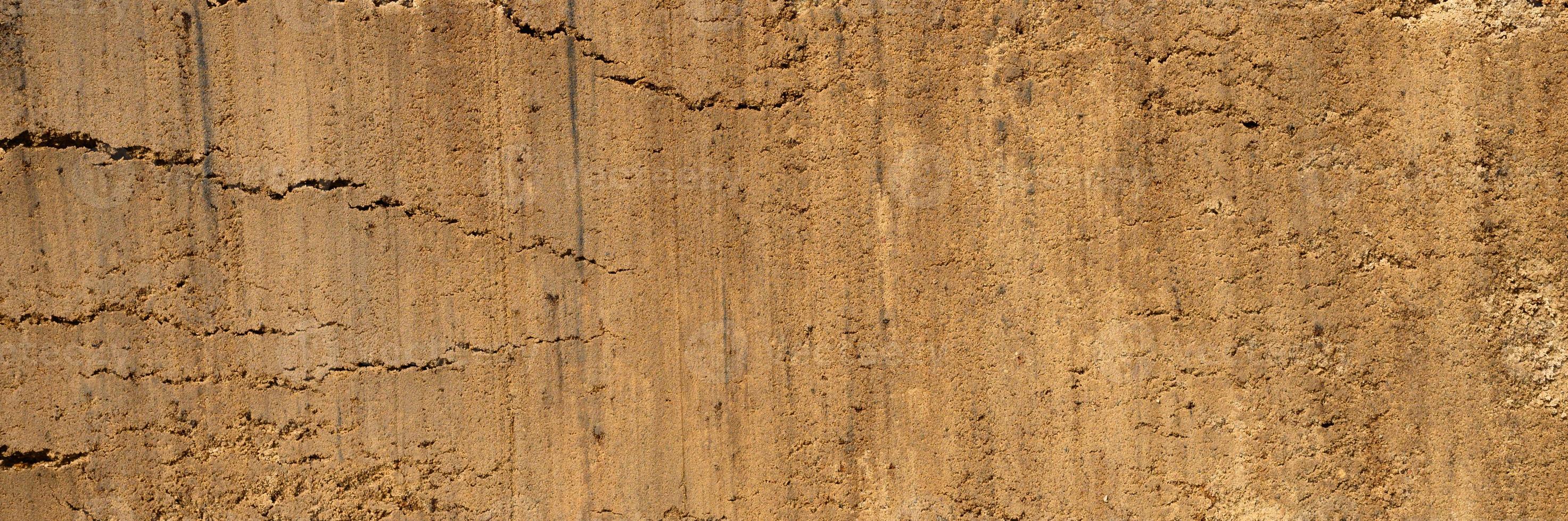 textura de fundo da superfície solta da areia e do solo foto