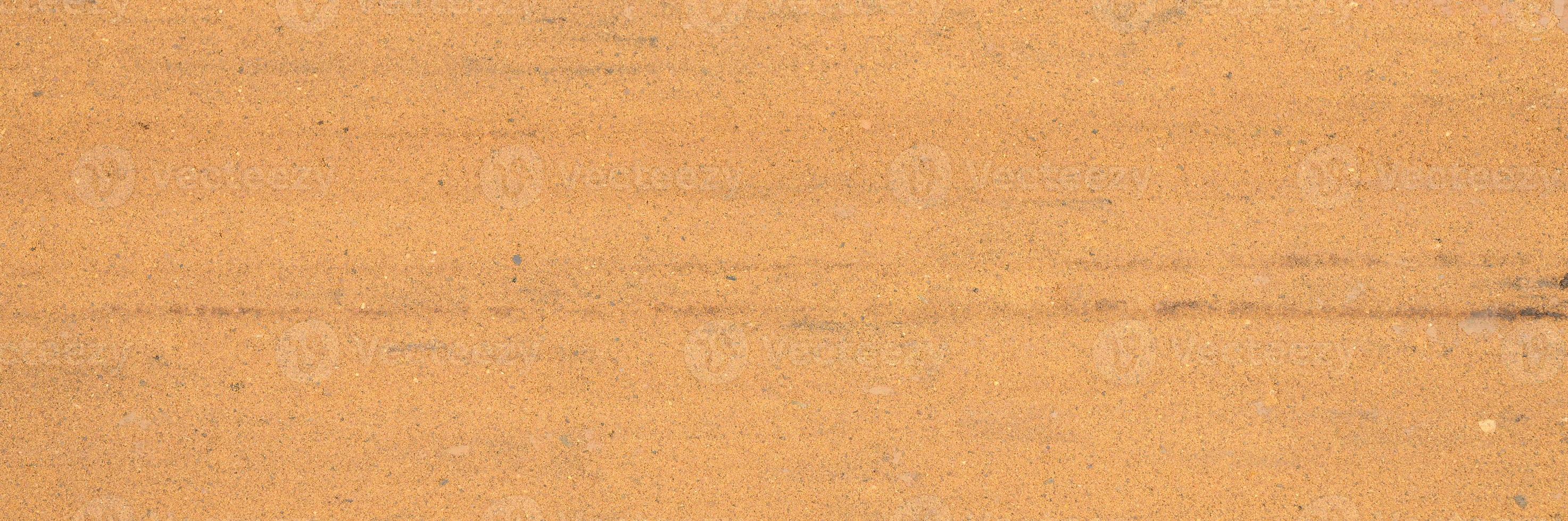 textura de fundo da superfície lisa da areia foto