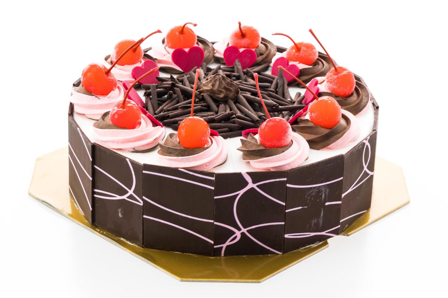 bolo de chocolate com cereja por cima foto
